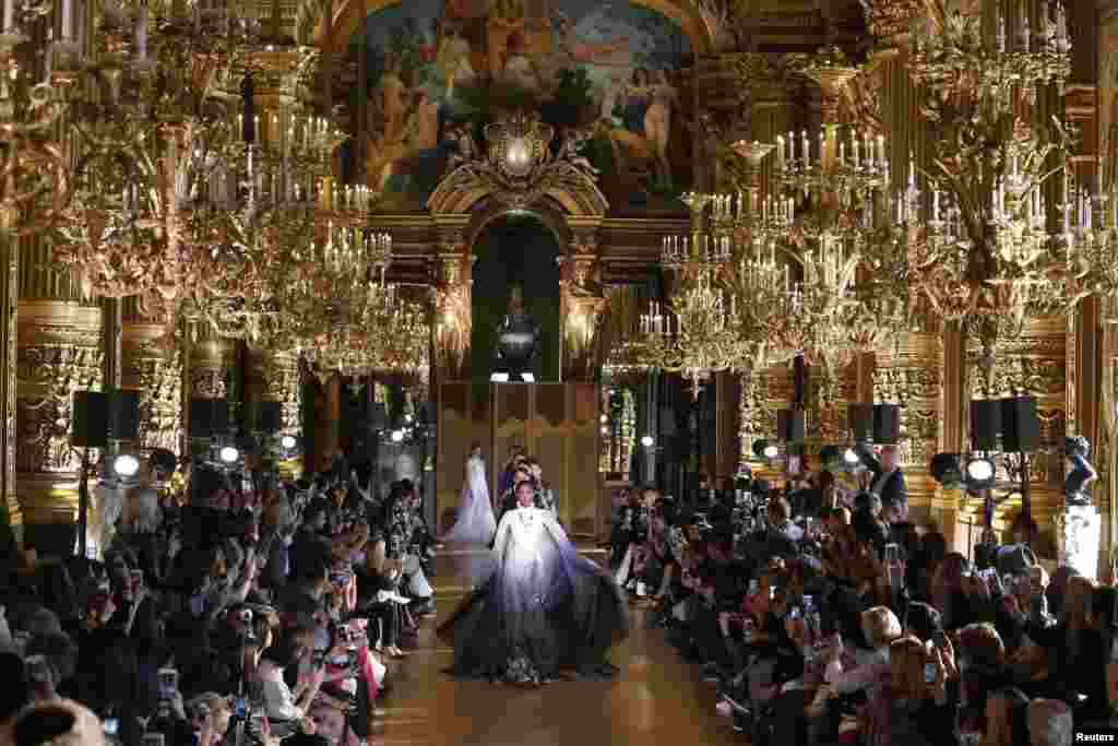 A model presents a creation by Chinese designer Xiong Ying as part of her Spring/Summer 2017 women's ready-to-wear collection for fashion house Heaven Gaia during Fashion Week in Paris, France.