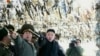 3月12日金正恩在与韩国交接的有争议海域前沿的一岛屿视察炮兵部队时指向韩国一岛屿
