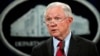 FILE - United States Attorney General Jeff Sessions speaks during a news conference at the Justice Department in Washington, Dec. 15, 2017. 
