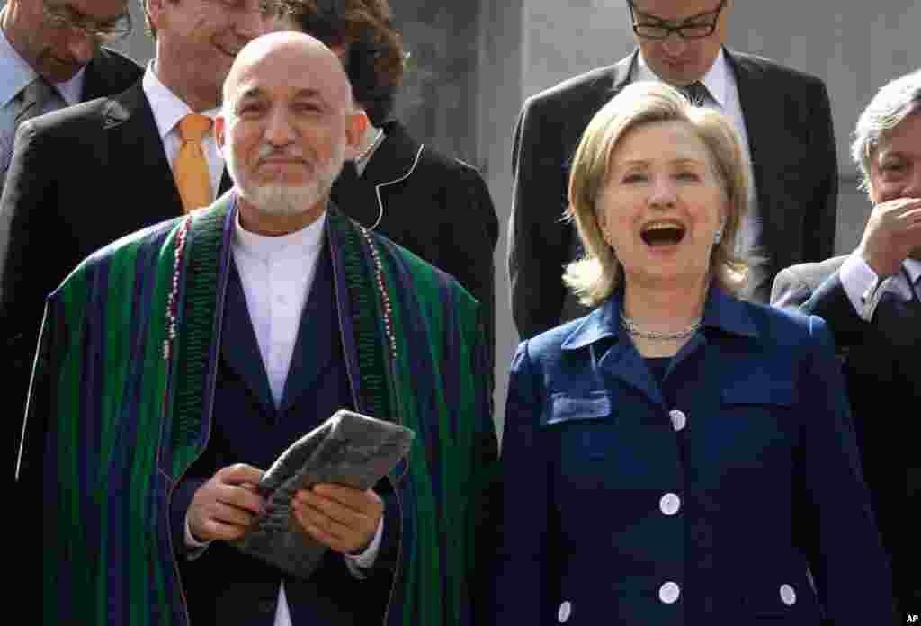 Afghan President Hamid Karzai, Clinton, and other foreign ministers pose for a group photo after the Kabul International Conference at the Foreign Ministry in Kabul, Afghanistan, July 20, 2010.