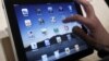 An iPad with many choices of apps