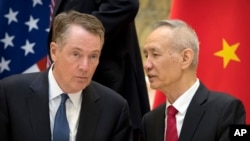 美国贸易代表莱特希泽和中国副总理刘鹤在北京钓鱼台国宾馆交谈（2019年2月15日）