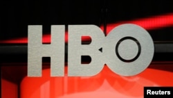 FILE - The logo for HBO,Home Box Office, the American premium cable television network, owned by Time Warner, is pictured in Beverly Hills, California, Aug.1, 2012. 
