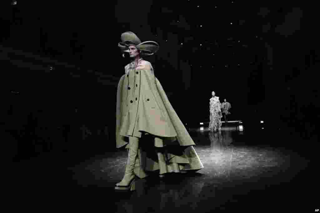 A model wears a creation for Jean Paul Gaultier's Haute Couture Fall-Winter 2021-2022 fashion collection presented in Paris.
