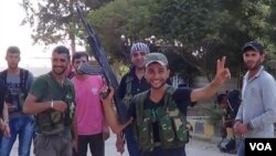 Şervanên YPG serkeftina xwe ya dijî el Nusra pîroz dikin Foto: Mafdar Serêkanîyê