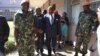 Former Malawi President Bakili Muluzi, center, is pictured outside the High Court in Blantyre. (L. Masina/VOA)