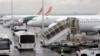 FILE - Air Cote d'Ivoire planes are seen at Felix Houphouet Boigny International airport, in Abidjan, Cote d' Ivoire, June 26, 2020. 
